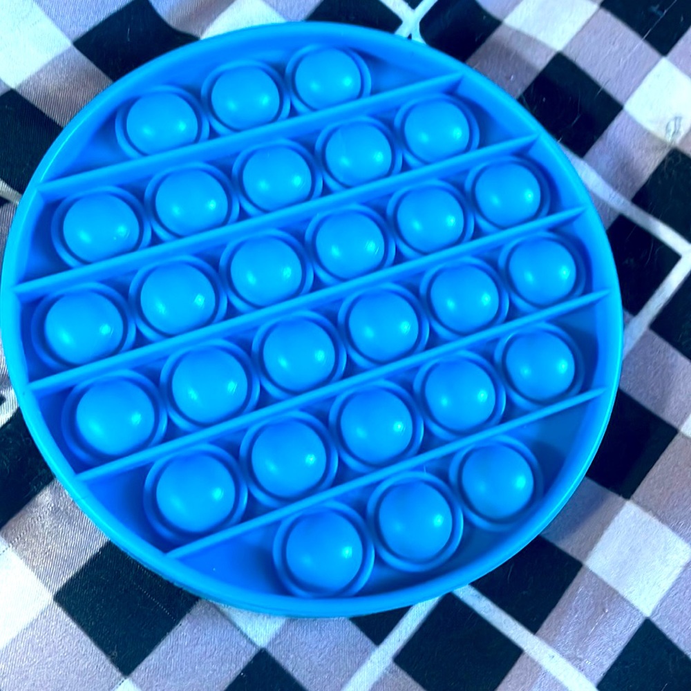 Blue pop it fidget toy circle